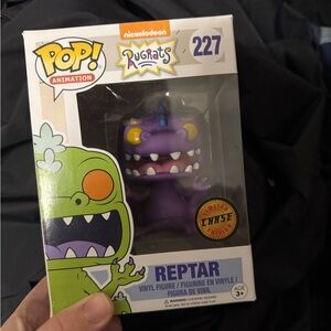 Funko Purple Reptile Figure with Iconic Features